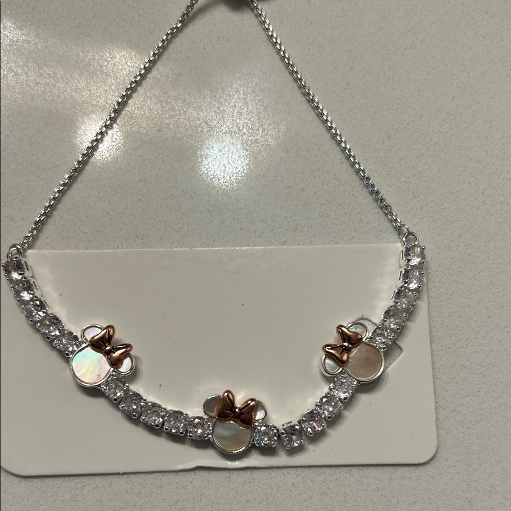 Elegant Silver and Rose Gold Bow Bracelet